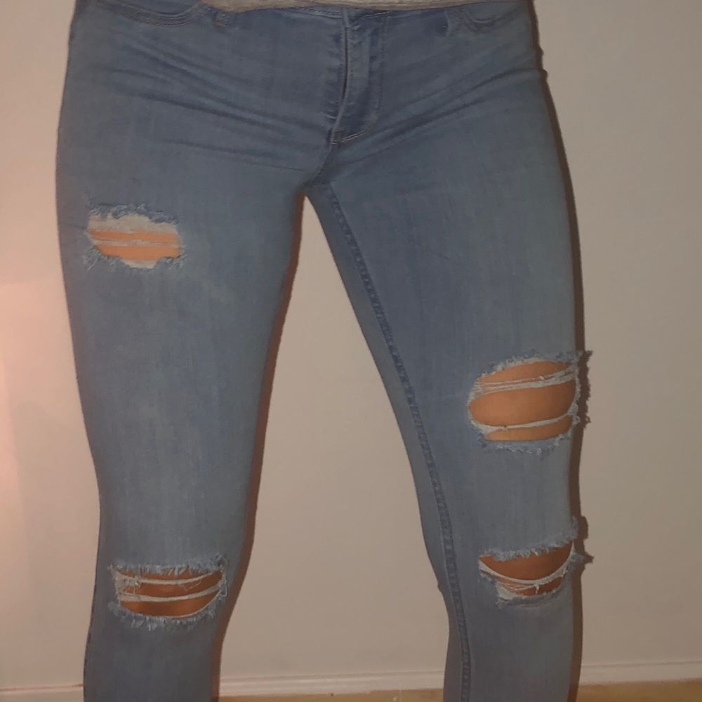 Light blue ripped jeans